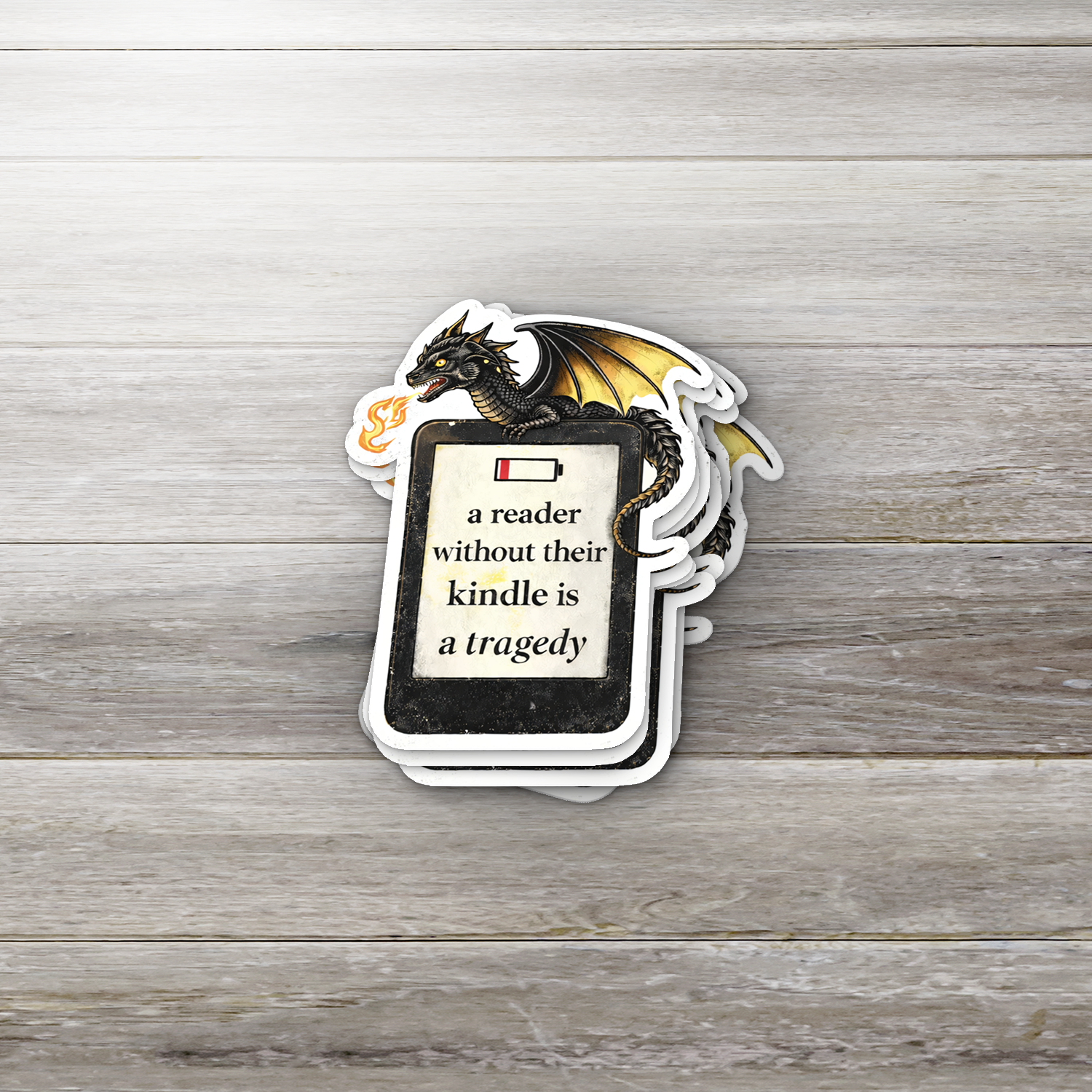 A Reader Without Their Kindle Is A Tragedy – Bookish Dragon Sticker